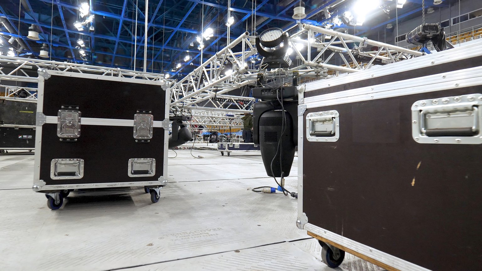 Installation of Equipment and Spotlights for Stage. Stock Footage. Preparing Stage with Bleachers and Professional Equipment and Floodlights before Performance or Competition